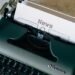 Typewriter and paper representing editorial journalism