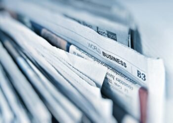 Newspapers laid out for reading