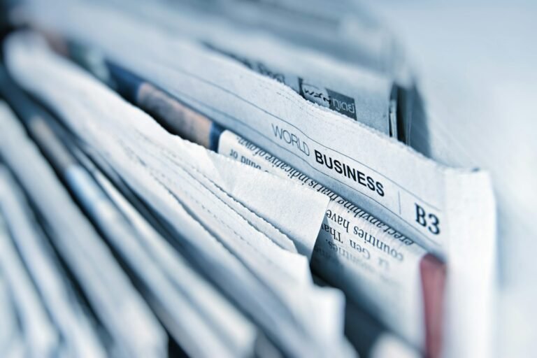 Newspapers laid out for reading